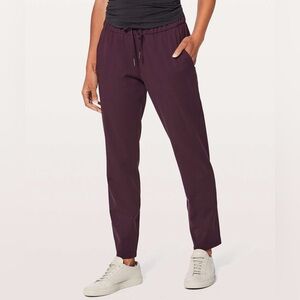 Lululemon On the Fly Pants – Size 4 (Black Cherry)